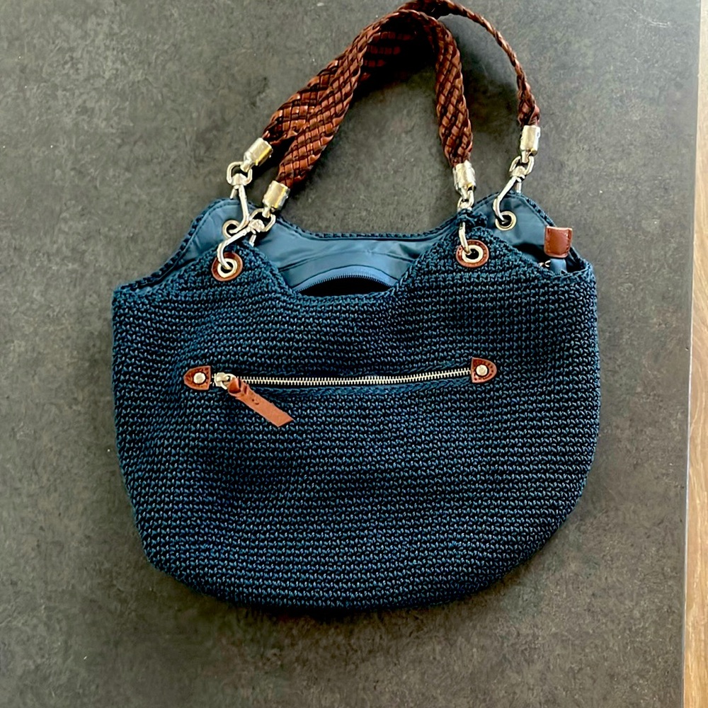 The Sak crochet purse navy blue w/ brown leather handle